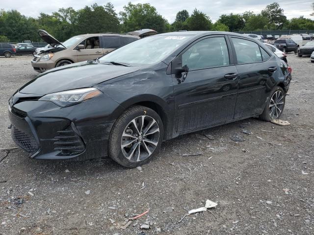 TOYOTA COROLLA L 2019 with VIN 2T1BURHE2KC163856 - Photo from auction
