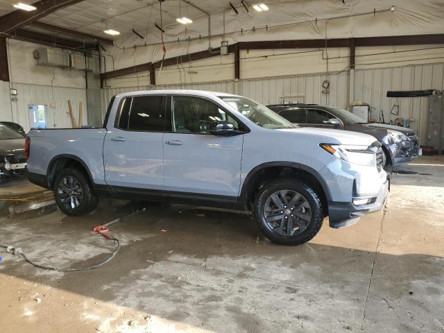 Photo 4 from auction – 2023 HONDA RIDGELINE with VIN 5FPYK3F17PB067969