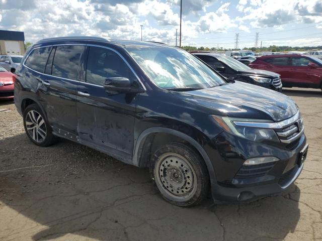 Photo 4 from auction – 2018 HONDA PILOT TOUR with VIN 5FNYF5H91JB021704