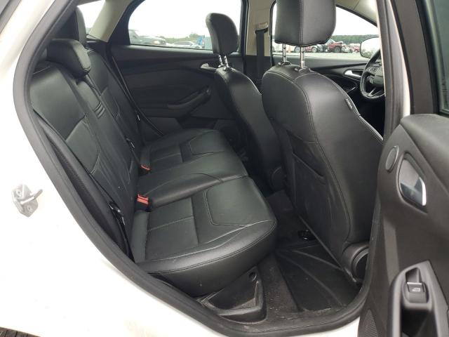 Photo 10 from auction – 2016 FORD FOCUS TITANIUM with VIN 1FADP3N22GL212468
