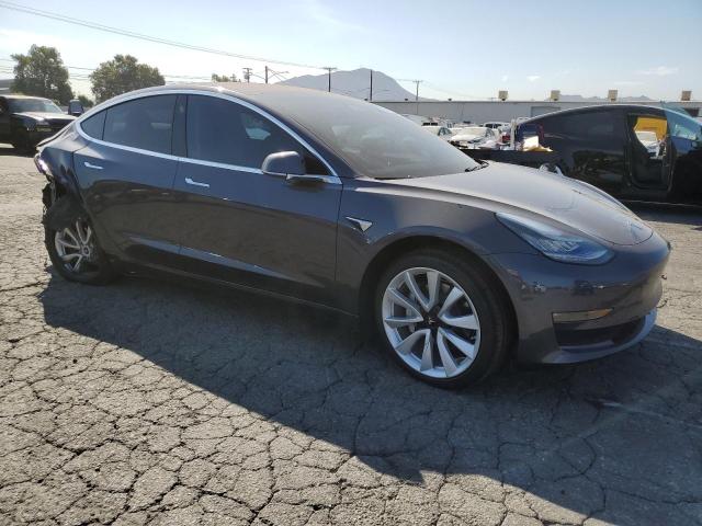 Photo 4 from auction – 2018 TESLA MODEL 3 with VIN 5YJ3E1EA5JF052829