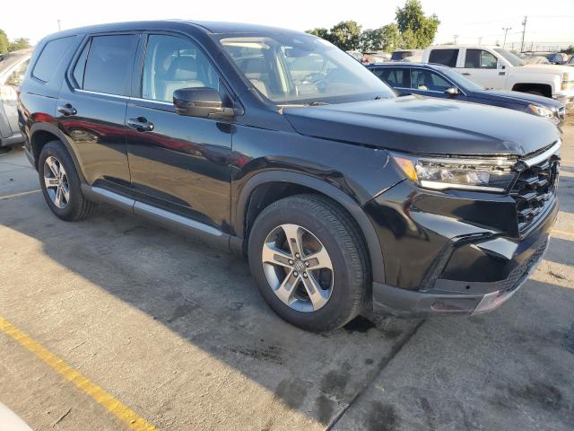 Photo 4 from auction – 2023 HONDA PILOT EXL with VIN 5FNYG1H47PB033195