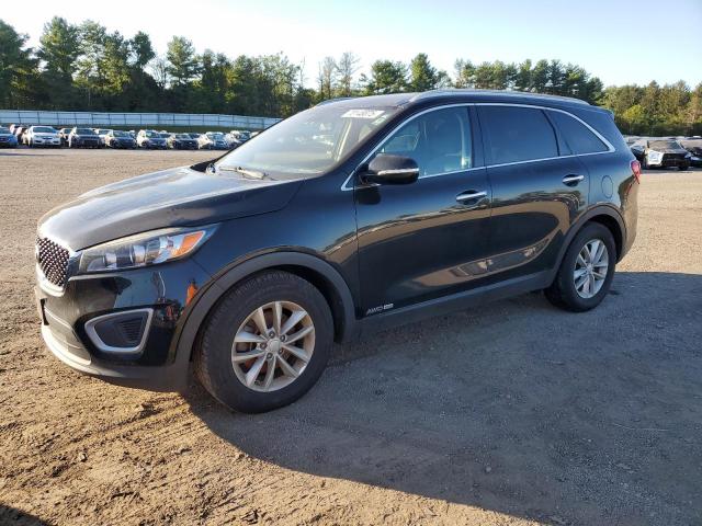 KIA SORENTO LX 2017 with VIN 5XYPGDA50HG329413 - Photo from auction
