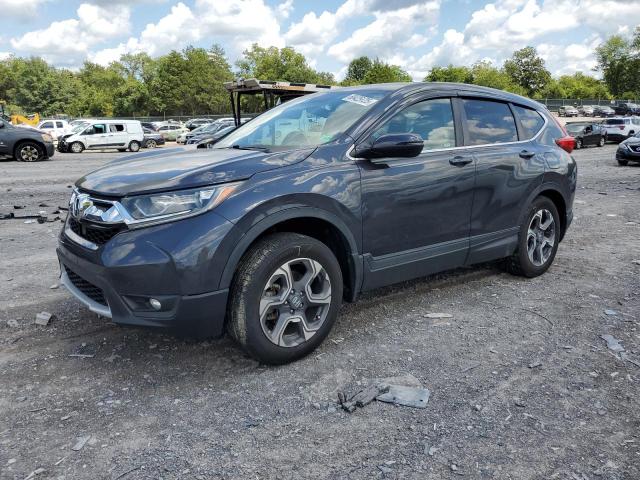 HONDA CR-V EX 2018 with VIN 7FARW2H50JE000511 - Photo from auction