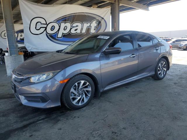 HONDA CIVIC EX 2016 with VIN 2HGFC2F7XGH552677 - Photo from auction
