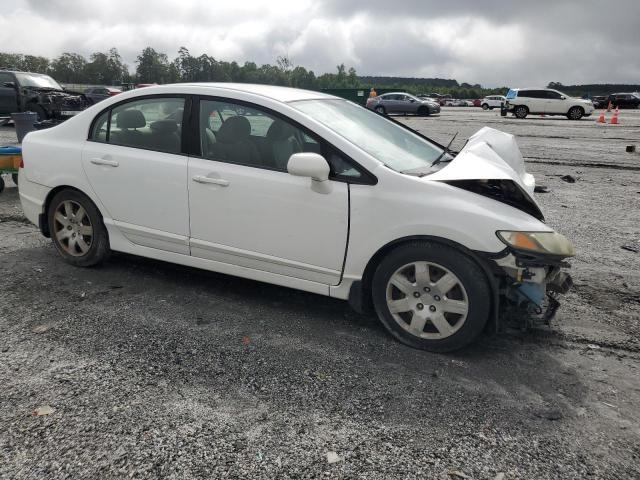 Photo 4 from auction – 2011 HONDA CIVIC LX with VIN 19XFA1F56BE027696