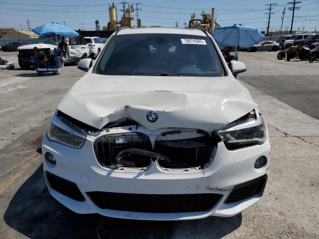 Photo 5 from auction – 2016 BMW X1 XDRIVE2 with VIN WBXHT3C3XG5F66705