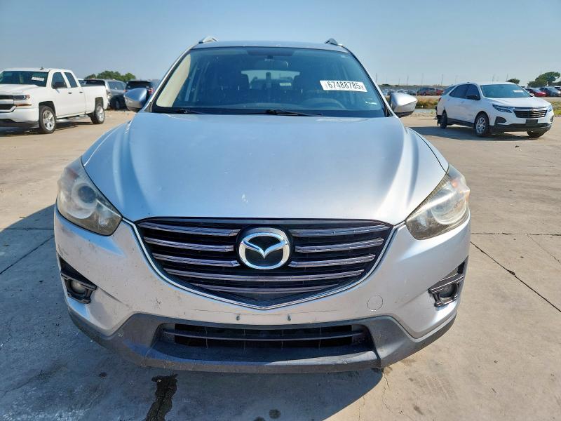 Photo 5 from auction – 2016 MAZDA CX-5 TOURI with VIN JM3KE2CY9G0832588