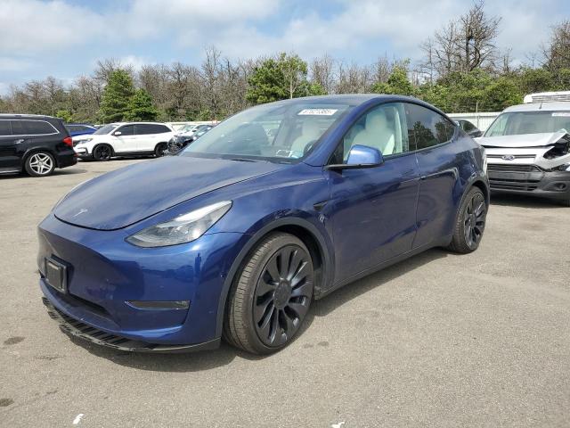 TESLA MODEL Y 2023 with VIN 7SAYGDEF6PF584681 - Photo from auction