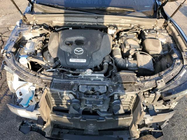Photo 11 from auction – 2023 MAZDA CX-50 PREMIUM with VIN 7MMVABDYXPN131982