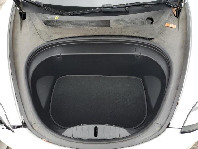 Photo 11 from auction – 2018 TESLA MODEL 3 with VIN 5YJ3E1EA5JF059120
