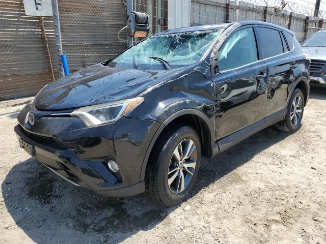 Photo 1 from auction – 2017 TOYOTA RAV4 XLE with VIN 2T3WFREV8HW402003