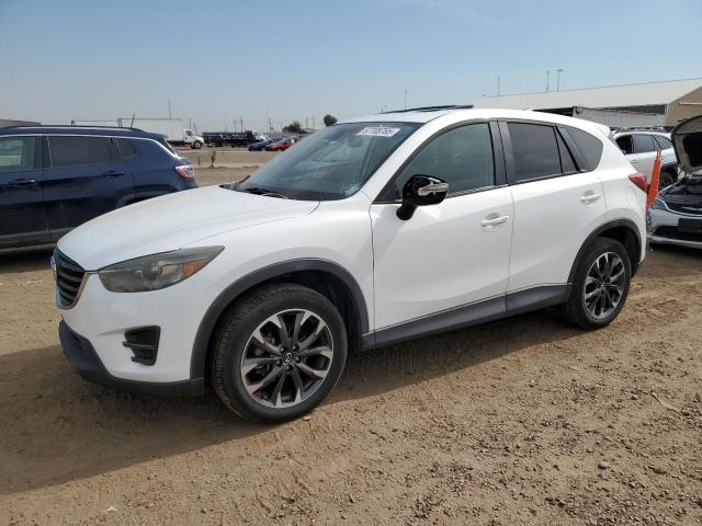 Photo 1 from auction – 2016 MAZDA CX-5 GT with VIN JM3KE2DY7G0773958