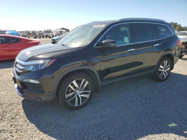 Photo 1 from auction – 2017 HONDA PILOT TOURING with VIN 5FNYF6H98HB097288