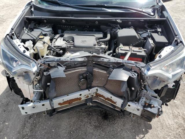 Photo 12 from auction – 2018 TOYOTA RAV4 LE with VIN 2T3BFREV6JW770975