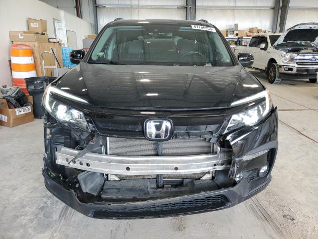 Photo 5 from auction – 2021 HONDA PILOT SE with VIN 5FNYF6H23MB008904