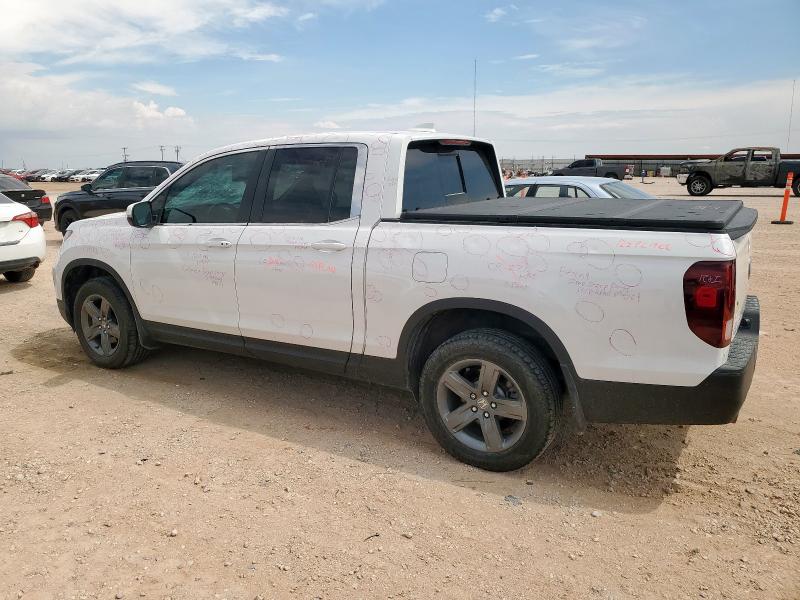 Photo 2 from auction – 2023 HONDA RIDGELINE with VIN 5FPYK3F59PB038413