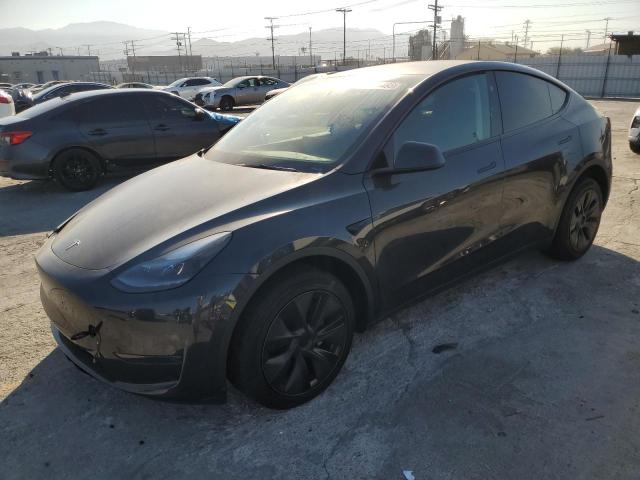TESLA MODEL Y 2025 with VIN 7SAYGDED3SF314489 - Photo from auction