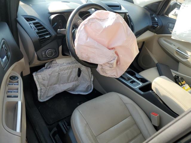 Photo 8 from auction – 2018 FORD ESCAPE TIT with VIN 1FMCU0J98JUD47421