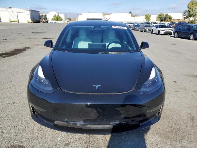 Photo 5 from auction – 2022 TESLA MODEL 3 with VIN 5YJ3E1EB5NF354961