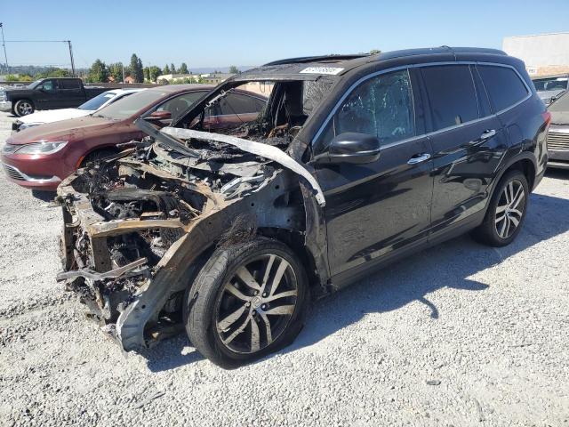 HONDA PILOT ELIT 2016 with VIN 5FNYF6H09GB093685 - Photo from auction