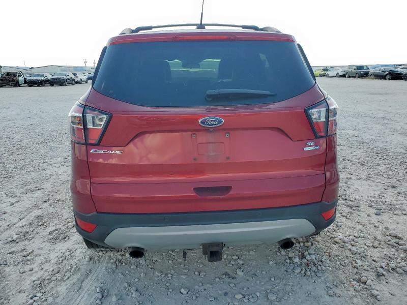 Photo 6 from auction – 2017 FORD ESCAPE SE with VIN 1FMCU9G98HUB79561