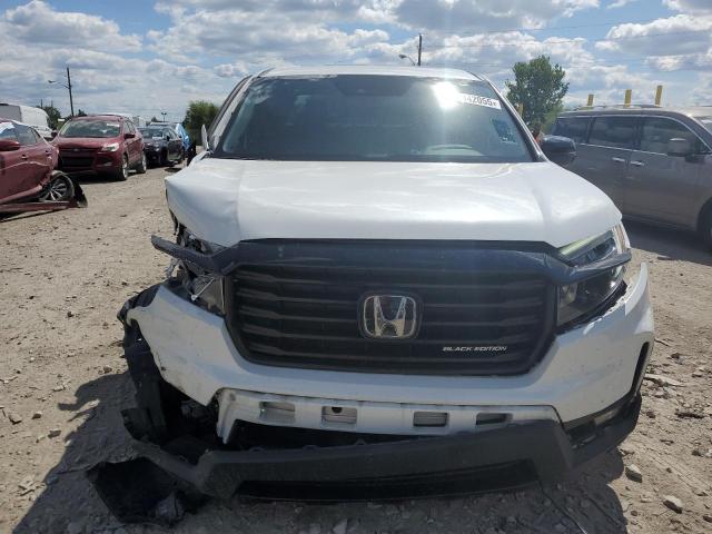 Photo 5 from auction – 2021 HONDA RIDGELINE with VIN 5FPYK3F87MB025472