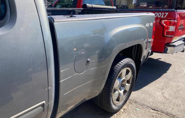 Photo 13 from auction – 2011 GMC SIERRA K15 with VIN 1GTR2VE37BZ351052