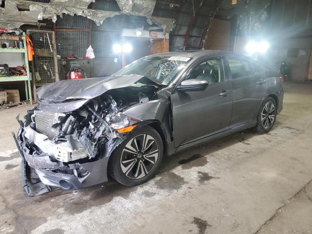 HONDA CIVIC EXL 2018 with VIN JHMFC1F79JX025210 - Photo from auction