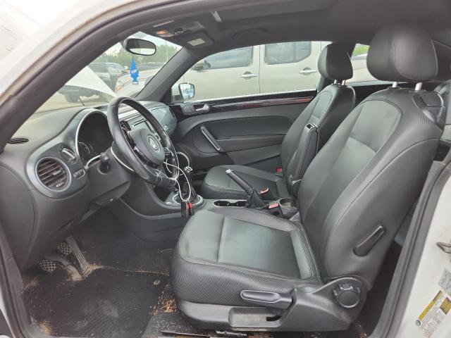 Photo 7 from auction – 2013 VOLKSWAGEN BEETLE with VIN 3VWHX7AT6DM603406
