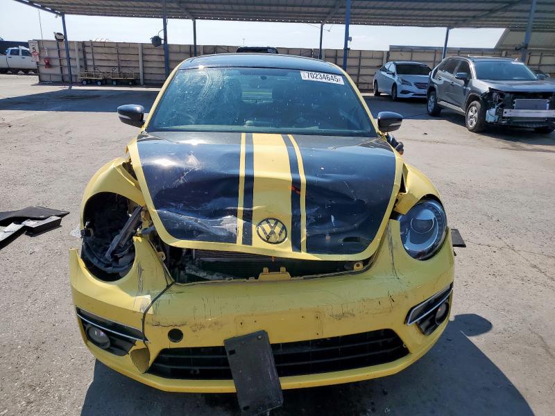 Photo 5 from auction – 2014 VOLKSWAGEN BEETLE TUR with VIN 3VWVS7AT2EM619220