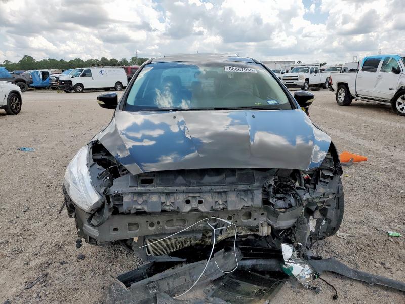 Photo 5 from auction – 2015 FORD FOCUS TITA with VIN 1FADP3J28FL386663