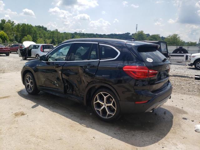 Photo 2 from auction – 2016 BMW X1 XDRIVE2 with VIN WBXHT3C3XG5E56303