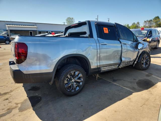 Photo 3 from auction – 2023 HONDA RIDGELINE with VIN 5FPYK3F12PB053350