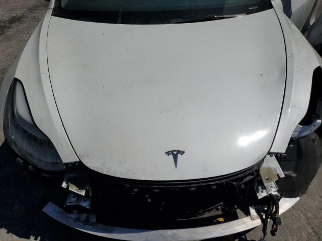 Photo 11 from auction – 2023 TESLA MODEL 3 with VIN 5YJ3E1EA9PF577286