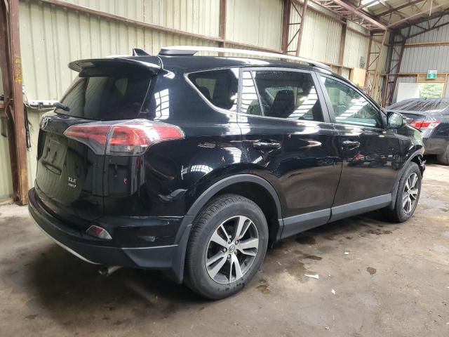 Photo 3 from auction – 2016 TOYOTA RAV4 XLE with VIN 2T3RFREV5GW449937