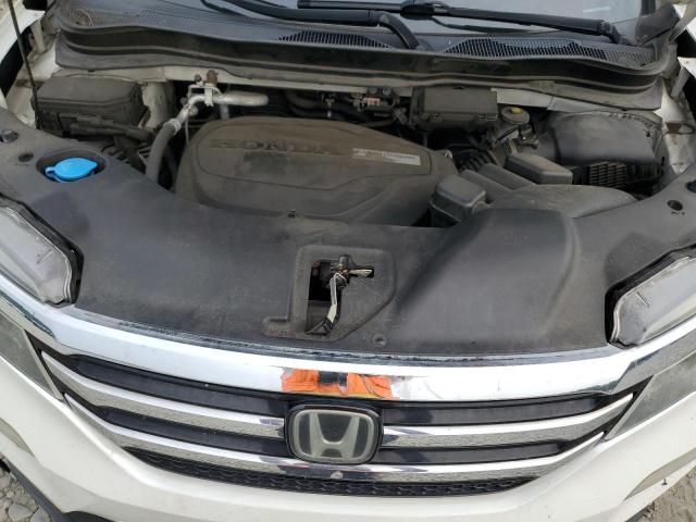 Photo 12 from auction – 2016 HONDA PILOT TOUR with VIN 5FNYF6H98GB083728