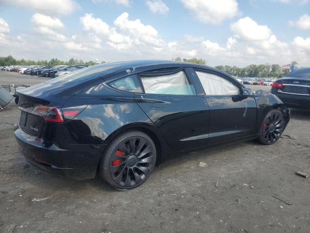 Photo 3 from auction – 2021 TESLA MODEL 3 with VIN 5YJ3E1EC8MF084602