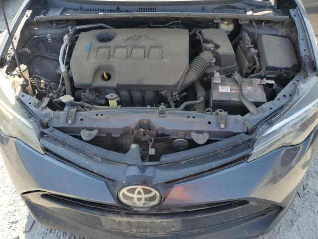 Photo 11 from auction – 2017 TOYOTA COROLLA L with VIN 5YFBURHEXHP586712