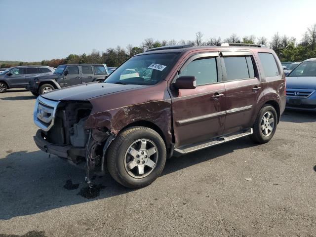 Photo 1 from auction – 2010 HONDA PILOT TOUR with VIN 5FNYF4H8XAB026496