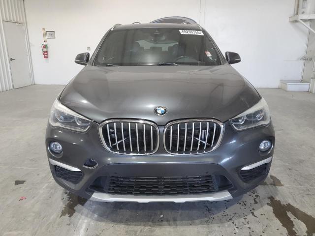 Photo 5 from auction – 2017 BMW X1 XDRIVE2 with VIN WBXHT3C34H5F70556