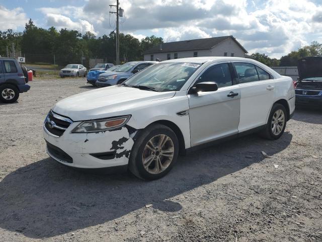 FORD TAURUS POL 2015 with VIN 1FAHP2L88FG137950 - Photo from auction