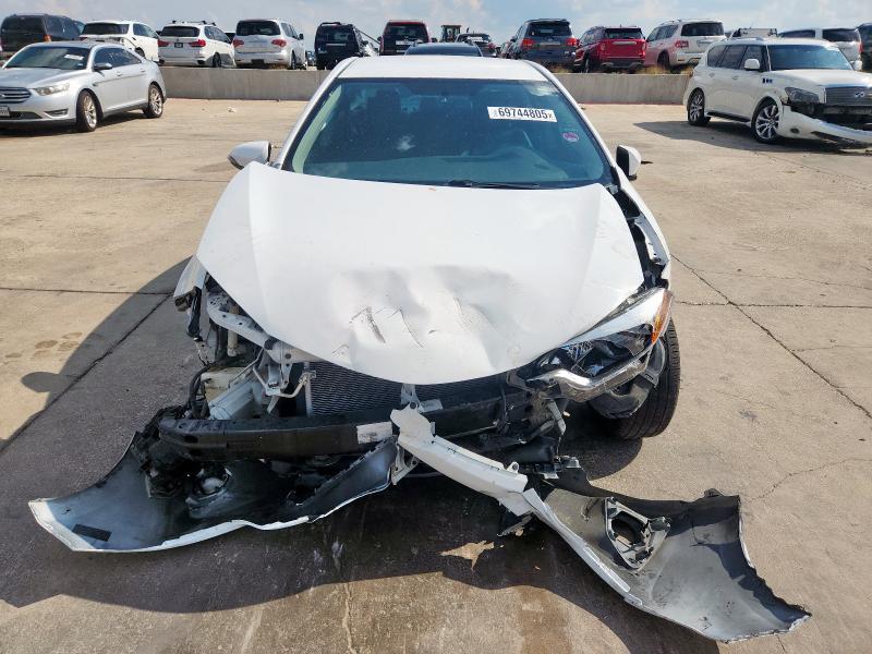 Photo 5 from auction – 2015 TOYOTA COROLLA L with VIN 5YFBURHE5FP292082