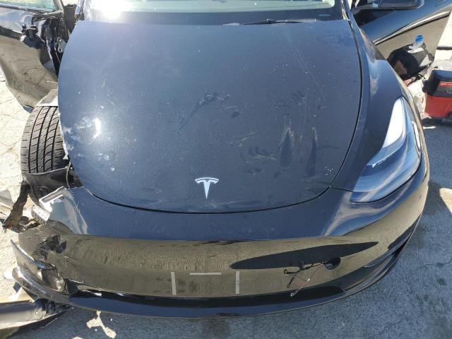 Foto 11 de la subasta – 2023 TESLA MODEL Y con VIN 7SAYGAEE3PF903721