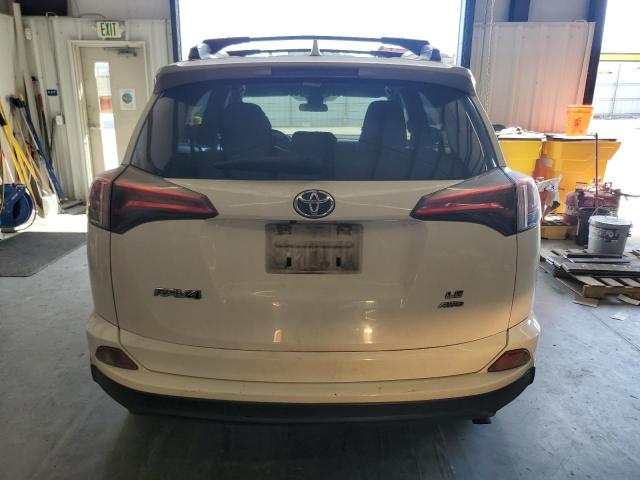 Photo 6 from auction – 2018 TOYOTA RAV4 LE with VIN JTMBFREV6JJ180953