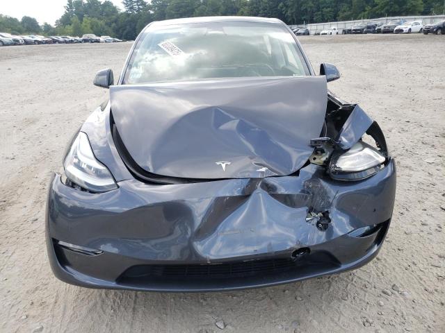 Photo 5 from auction – 2022 TESLA MODEL Y with VIN 7SAYGDEE4NF434119