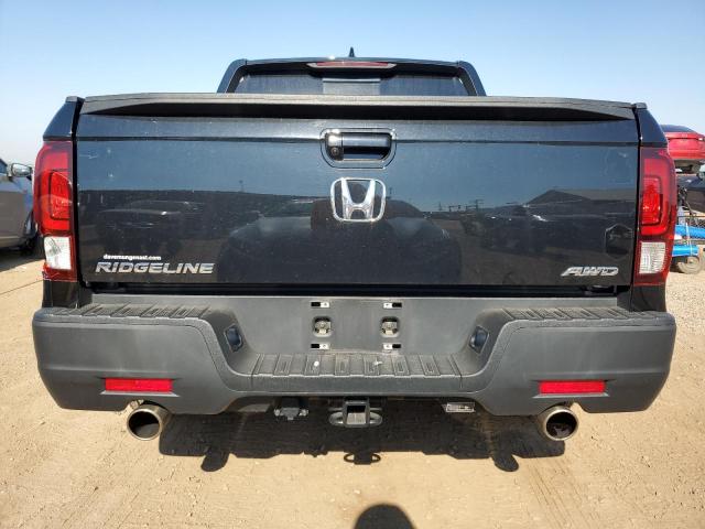 Photo 6 from auction – 2023 HONDA RIDGELINE with VIN 5FPYK3F52PB015913
