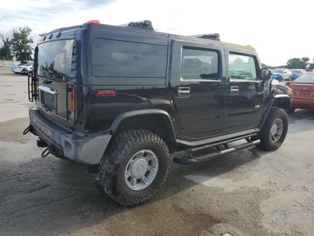Photo 3 from auction – 2003 HUMMER H2 with VIN 5GRGN23U93H138103