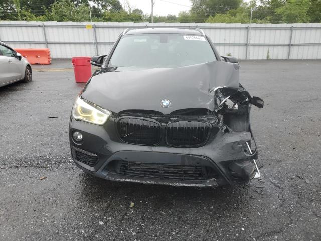 Photo 5 from auction – 2017 BMW X1 XDRIVE2 with VIN WBXHT3Z3XH4A64954