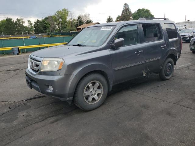 HONDA PILOT TOUR 2010 with VIN 5FNYF4H88AB015853 - Photo from auction